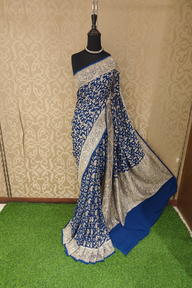 Deep blue crepe georgette saree with embroidery work and matching unstiched blouse, traditional wear by Saarang Sarees.