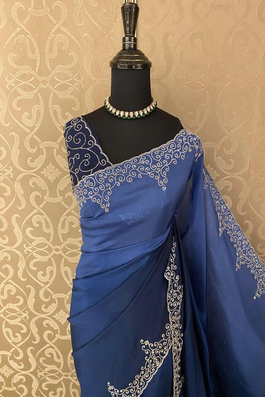 Navy blue soft organza silk saree with embroidery, party wear, from Saarang Sarees, shown with unstiched blouse for elegant occasion.