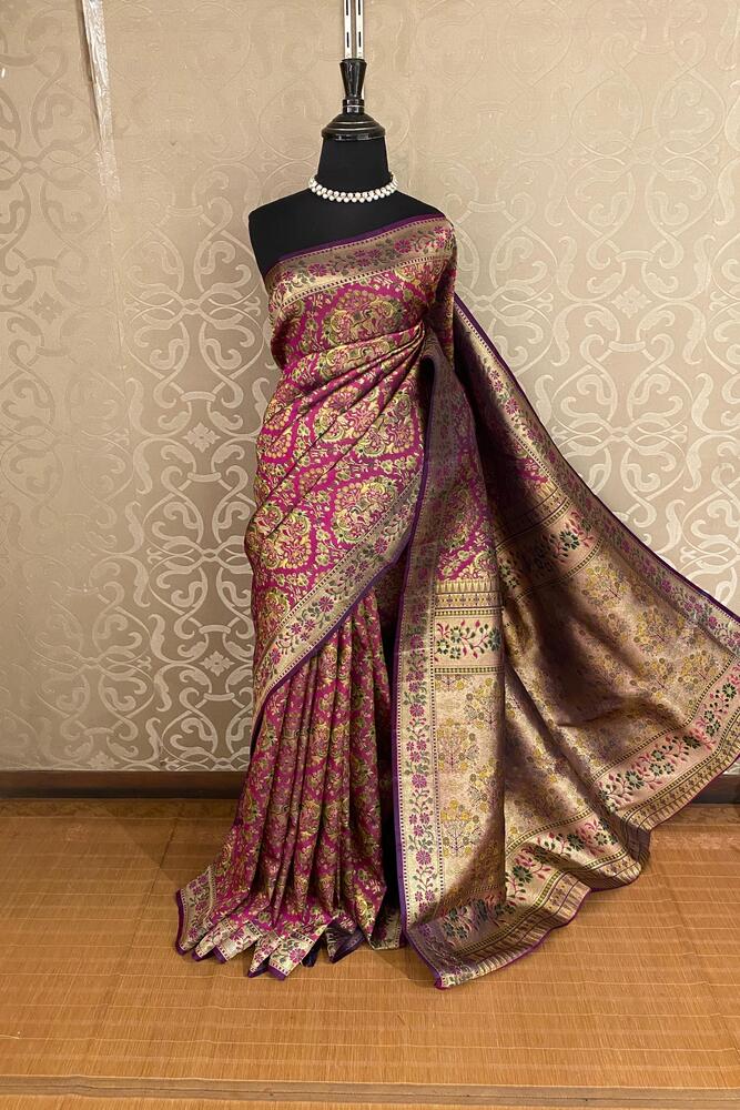 Deep purple pure Kanjeevaram silk saree from Saarang Sarees with an unstiched blouse, traditional Indian wear showcasing intricate silk patterns.
