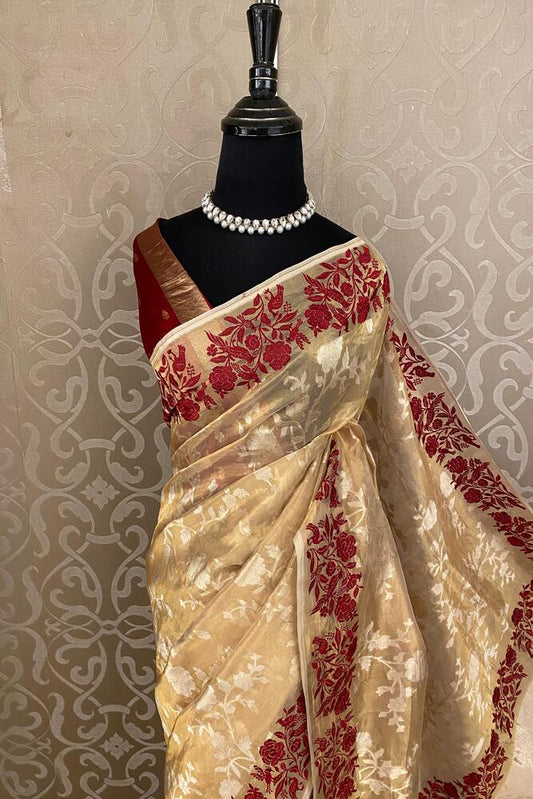 Beige tissue Banarasi silk saree with Resham embroidery border and unstiched blouse, perfect for party wear by Saarang Sarees.