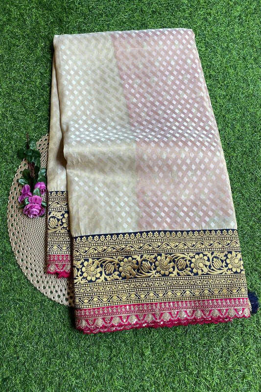 Off-White Gold Tissue Khaddi saree with embroidery border and unstiched blouse, traditional wear by Saarang Sarees.