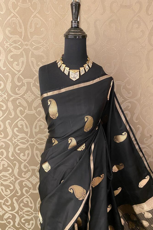 Black Katan Mashru silk Banarasi handloom saree with intricate gold zari work and matching unstiched blouse, traditional Indian wear.