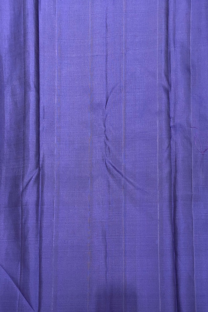 Navy blue pure Kanjeevaram silk saree with traditional design and unstiched blouse, crafted by Saarang Sarees for elegant wear.