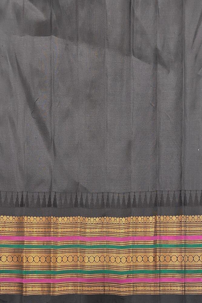 Off-White Gadwal silk saree with intricate traditional designs and matching unstitched blouse from Saarang Sarees.