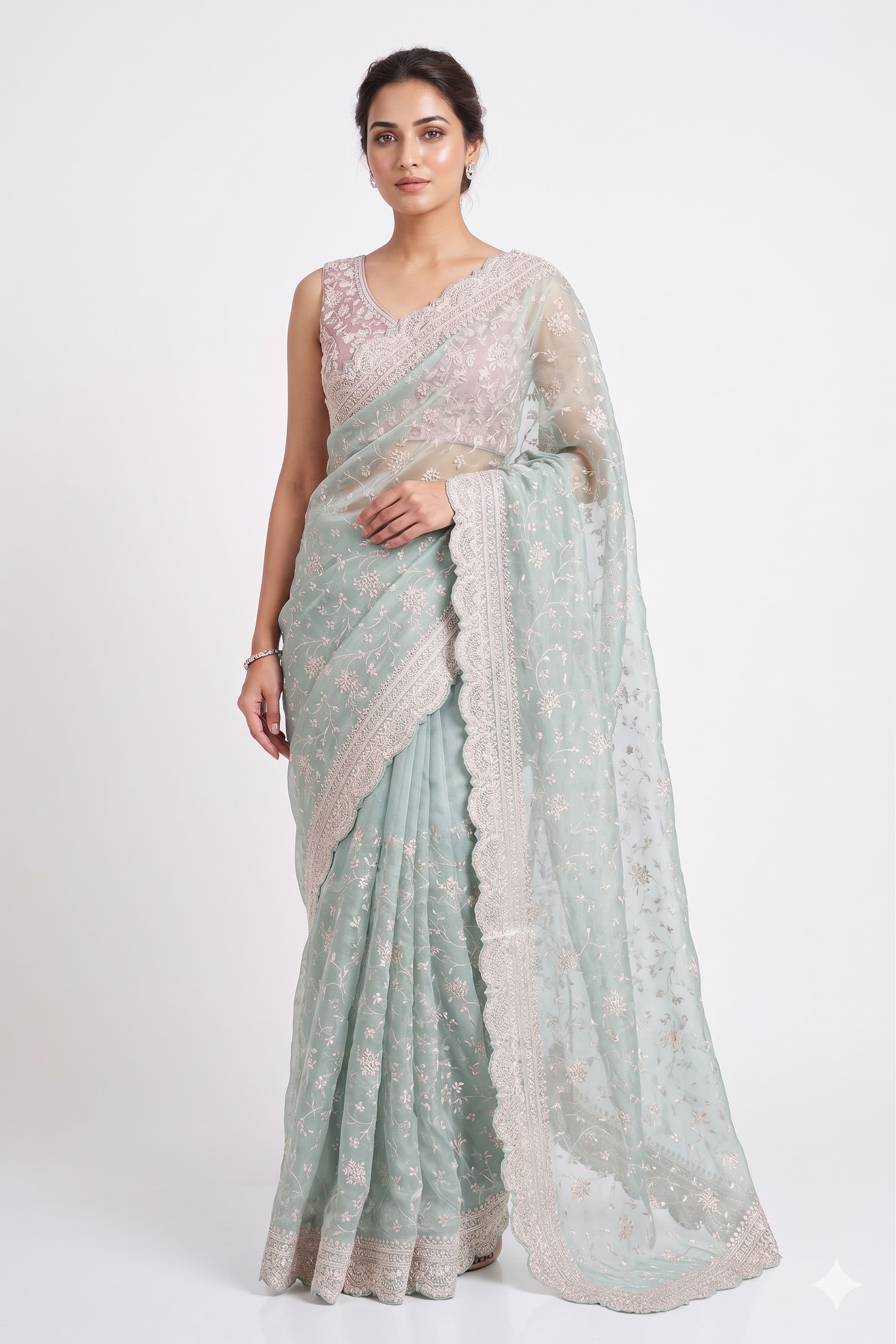 Light blue tissue organza silk saree with embroidery and unstiched blouse, perfect for party wear by Saarang Sarees.
