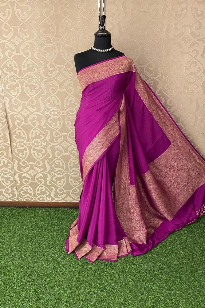 Magenta Mysore Crepe Silk Banarasi Saree with intricate gold zari work and matching unstiched blouse for traditional wear.