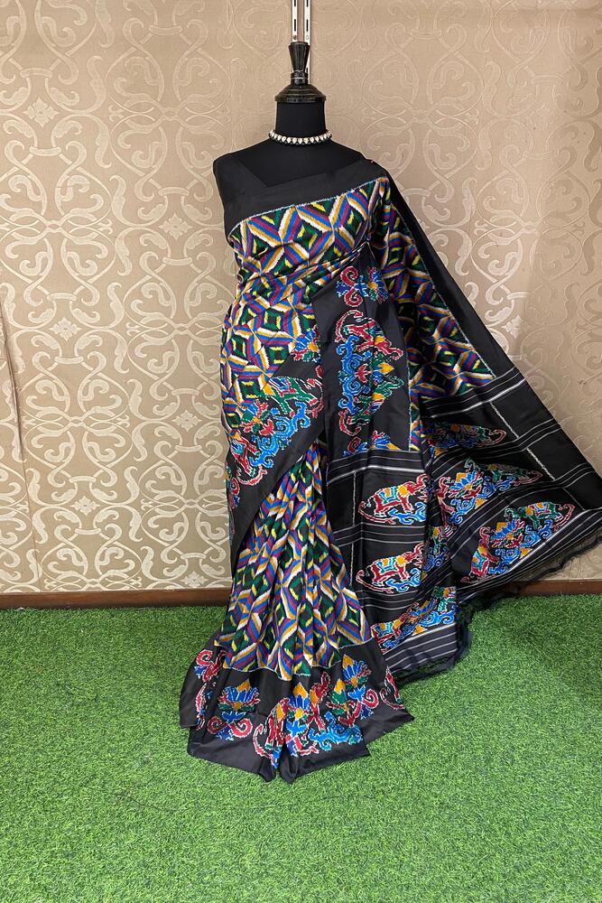 Black Pochampally Ikat silk saree with multi-color weaving and unstiched blouse, traditional wear by Saarang Sarees.
