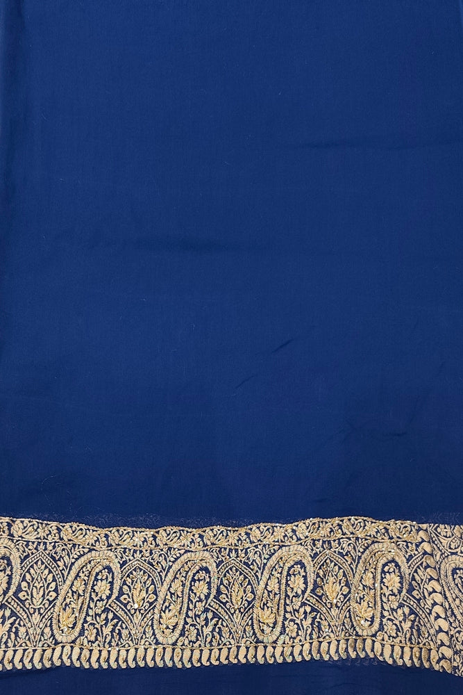 Deep blue crepe georgette saree with embroidery work and unstiched blouse, traditional wear by Saarang Sarees.