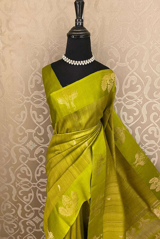 Lime green tussar handloom saree with mashru border and unstiched blouse, traditional wear by Saarang Sarees.