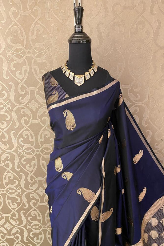 Deep navy blue Katan Mashru silk Banarasi saree with intricate gold zari work and unstiched matching blouse, traditional handloom wear.