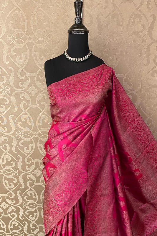 Elegant Rani Pure Kanjeevaram Silk Saree by Saarang Sarees with intricate gold zari work and an unstiched matching blouse.