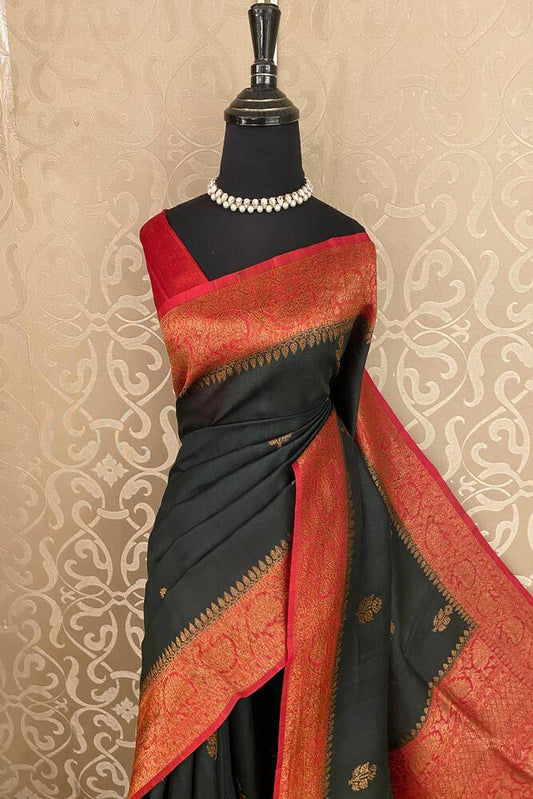 Black Tussar Banarasi silk saree with hand-woven motifs and matching unstiched blouse, traditional wear by Saarang Sarees.
