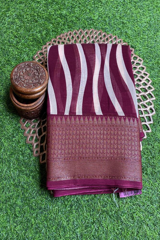 Elegant Wine Cotton Chanderi saree with intricate traditional patterns, paired with an unstiched blouse from Saarang Sarees.