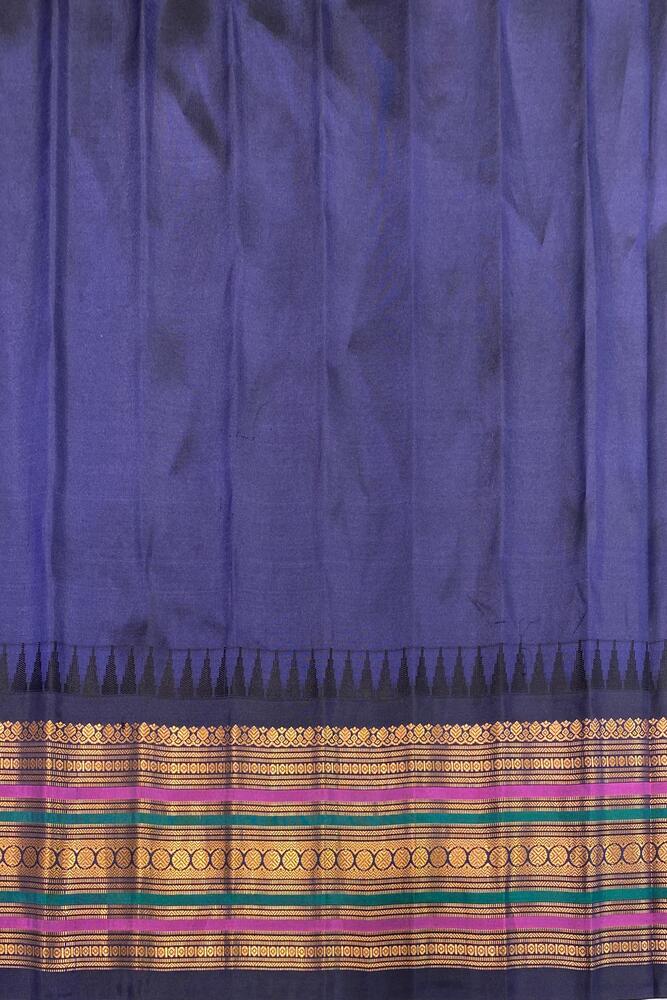 Off-White Gadwal silk saree with intricate designs and a matching unstiched blouse from Saarang Sarees, traditional Indian wear.