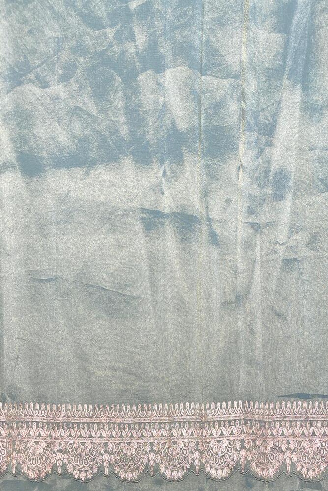Light blue tissue organza silk party wear saree with embroidery and unstiched blouse by Saarang Sarees