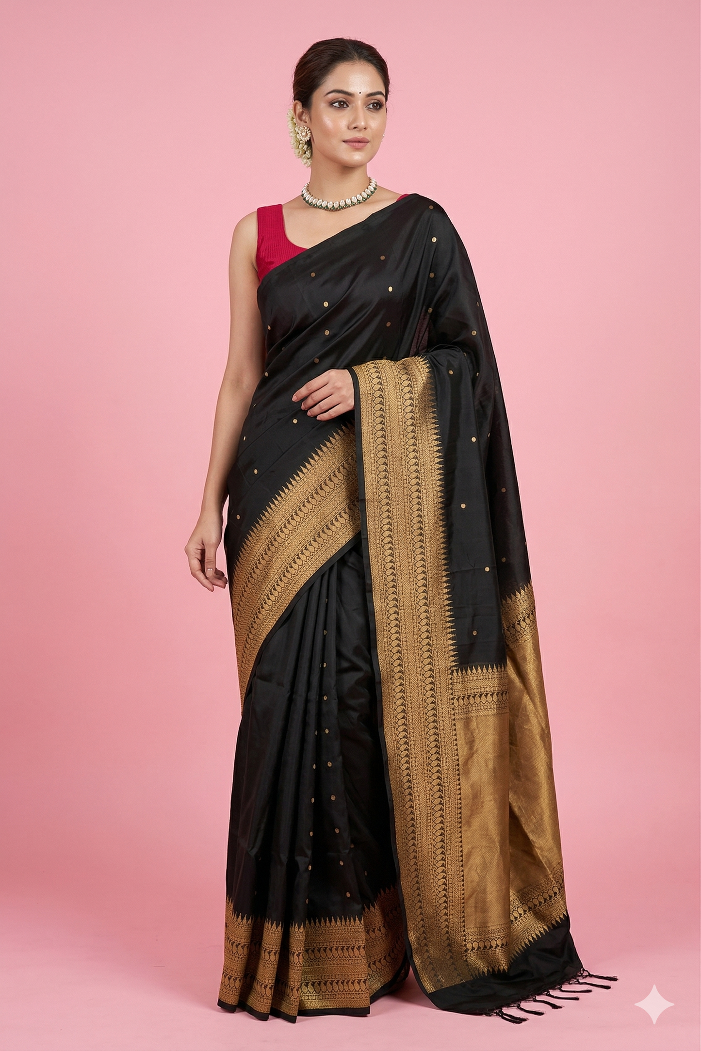 Black Coimbatore silk saree with intricate traditional design and matching unstiched blouse, crafted by Saarang Sarees.