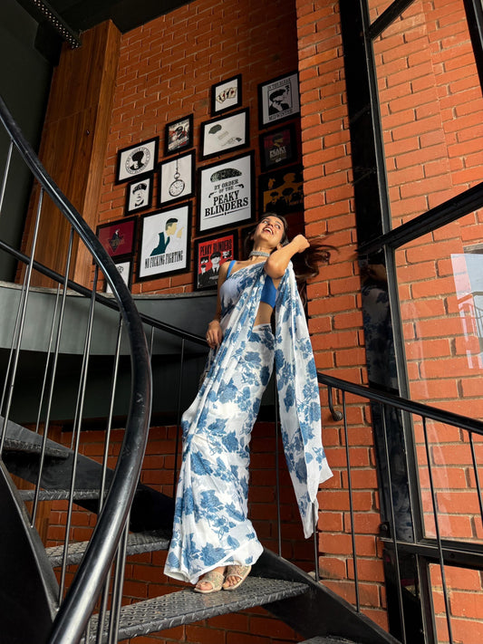 Off-White and blue floral printed chiffon saree with unstiched blouse piece, ideal for party wear by Saarang Sarees.
