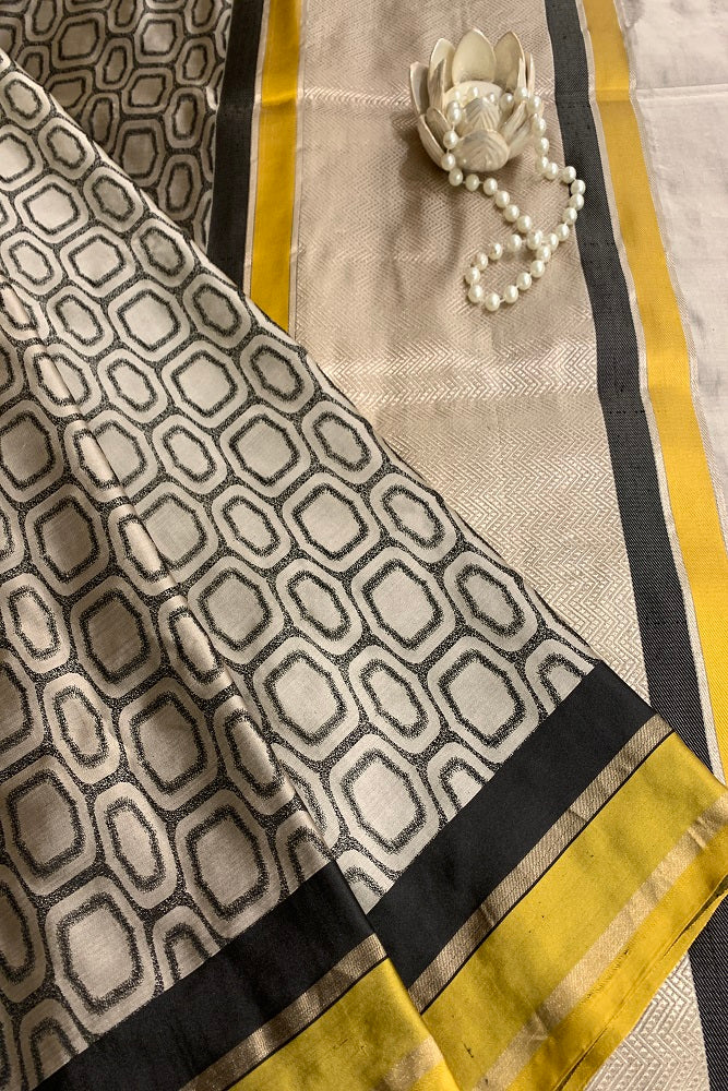 OFFWHITE BLACK KADIYAL BANARASI SILK SAREE WITH HAND INTERWOVEN CONTRAST BORDER