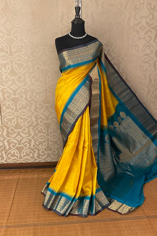 Yellow Gadwal Silk Saree With Unstiched Contrast Blouse