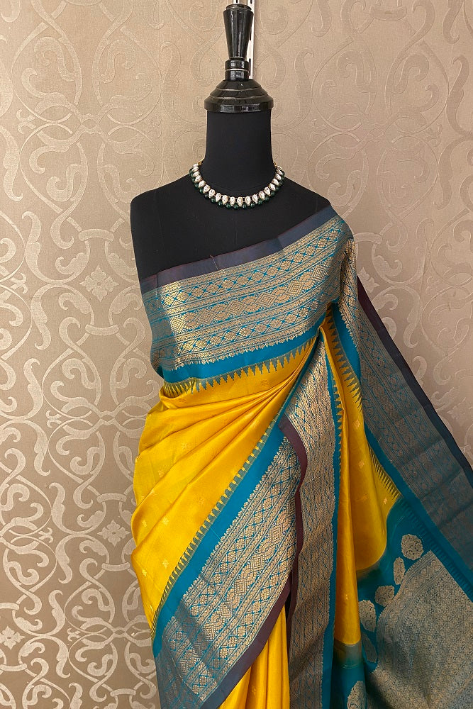 Yellow Gadwal Silk Saree With Unstiched Contrast Blouse